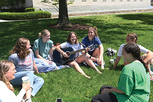 Students singing together. Links to Gifts That Protect Your Assets