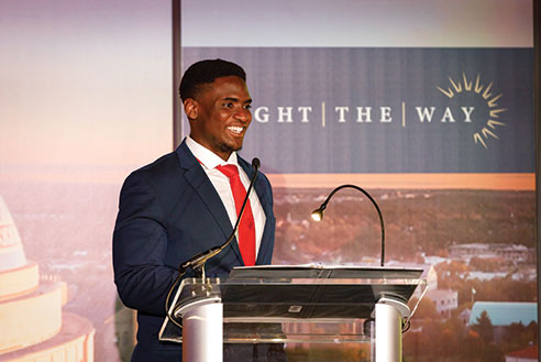 A student smiling. Links to Gifts from Retirement Plans