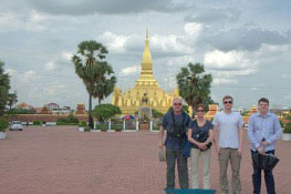 Mark Reinhardt and his family at The Golden Temple, Laos